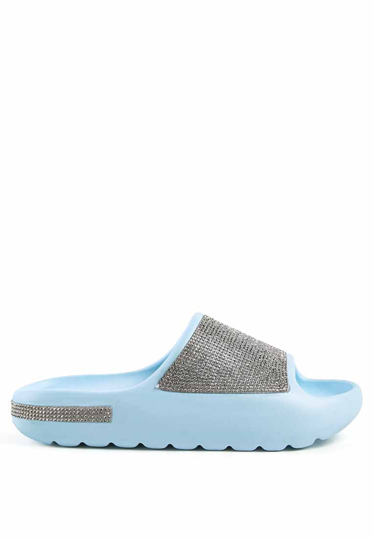 Dumba Diamante Pool Sliders showcasing shiny diamante details and a comfortable molded footbed, perfect for summer wear.