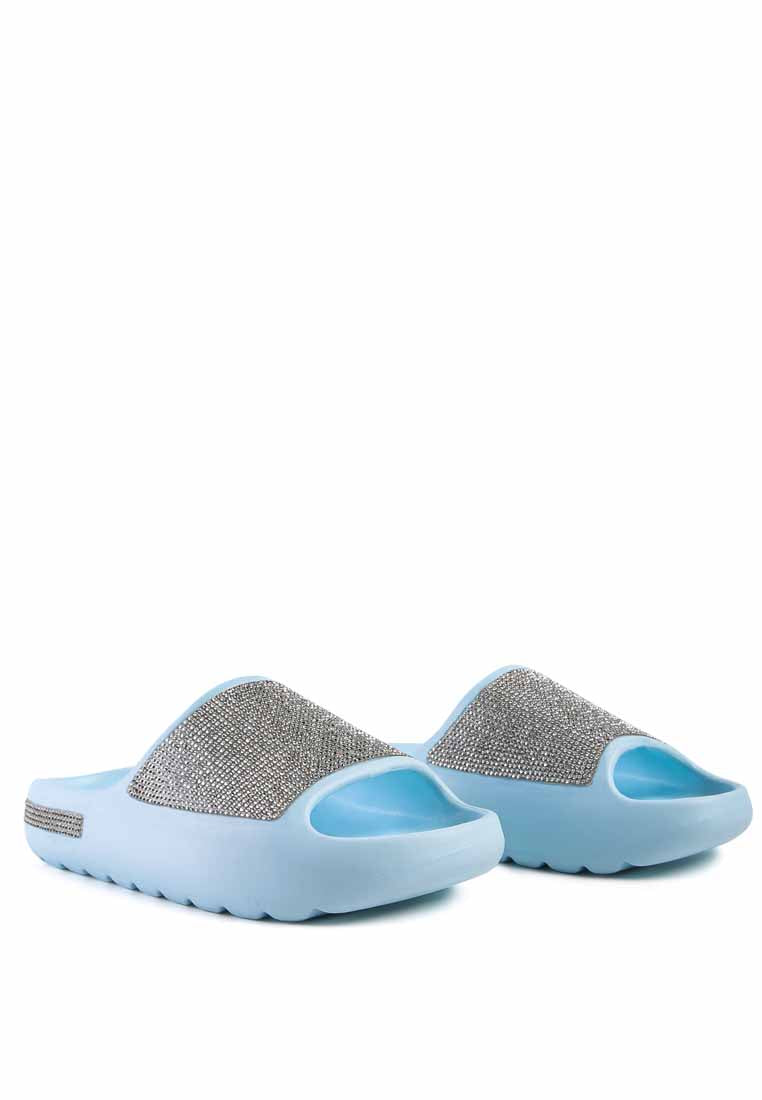 Dumba Diamante Pool Sliders showcasing shiny diamante details and a comfortable molded footbed, perfect for summer wear.