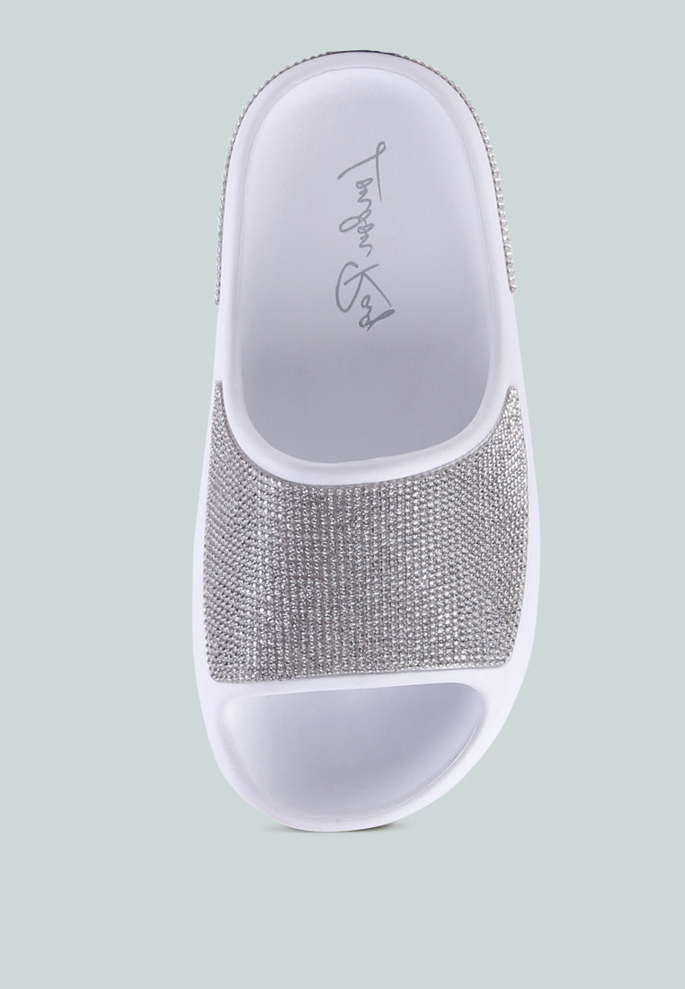 Dumba Diamante Pool Sliders showcasing shiny diamante details and a comfortable molded footbed, perfect for summer wear.