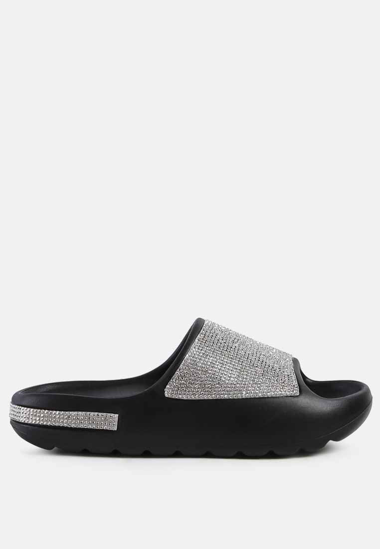 Dumba Diamante Pool Sliders showcasing shiny diamante details and a comfortable molded footbed, perfect for summer wear.