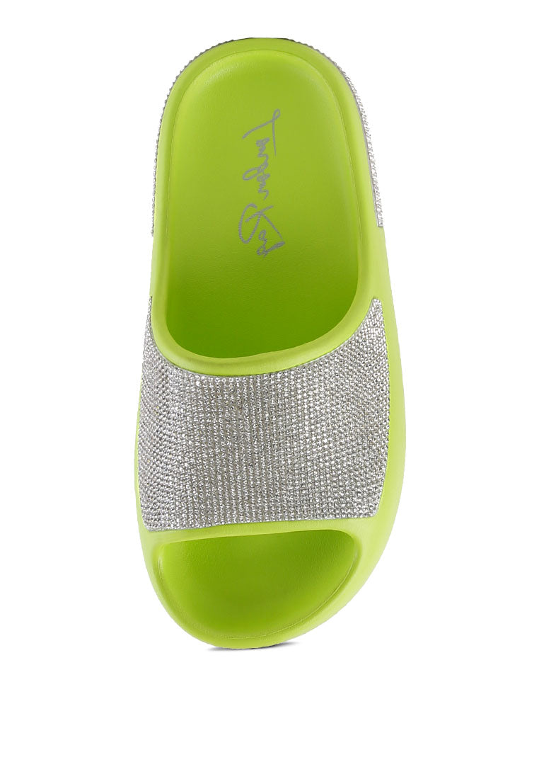 Dumba Diamante Pool Sliders showcasing shiny diamante details and a comfortable molded footbed, perfect for summer wear.