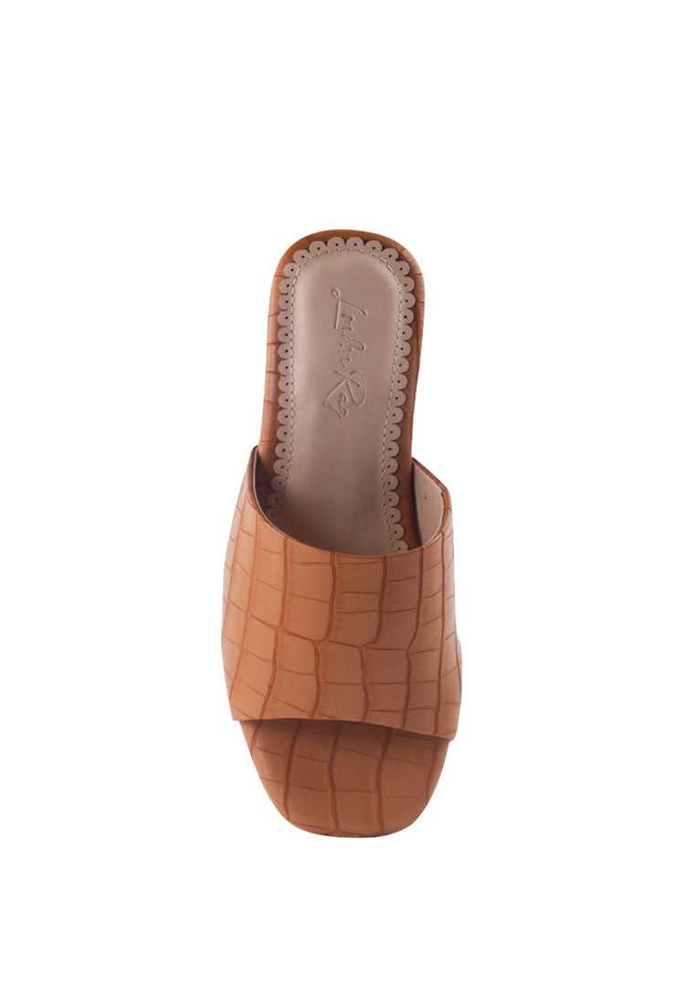 Dumpllin Croco Slip-On Block Heel Sandals featuring a stylish croc pattern and mid block heel design.