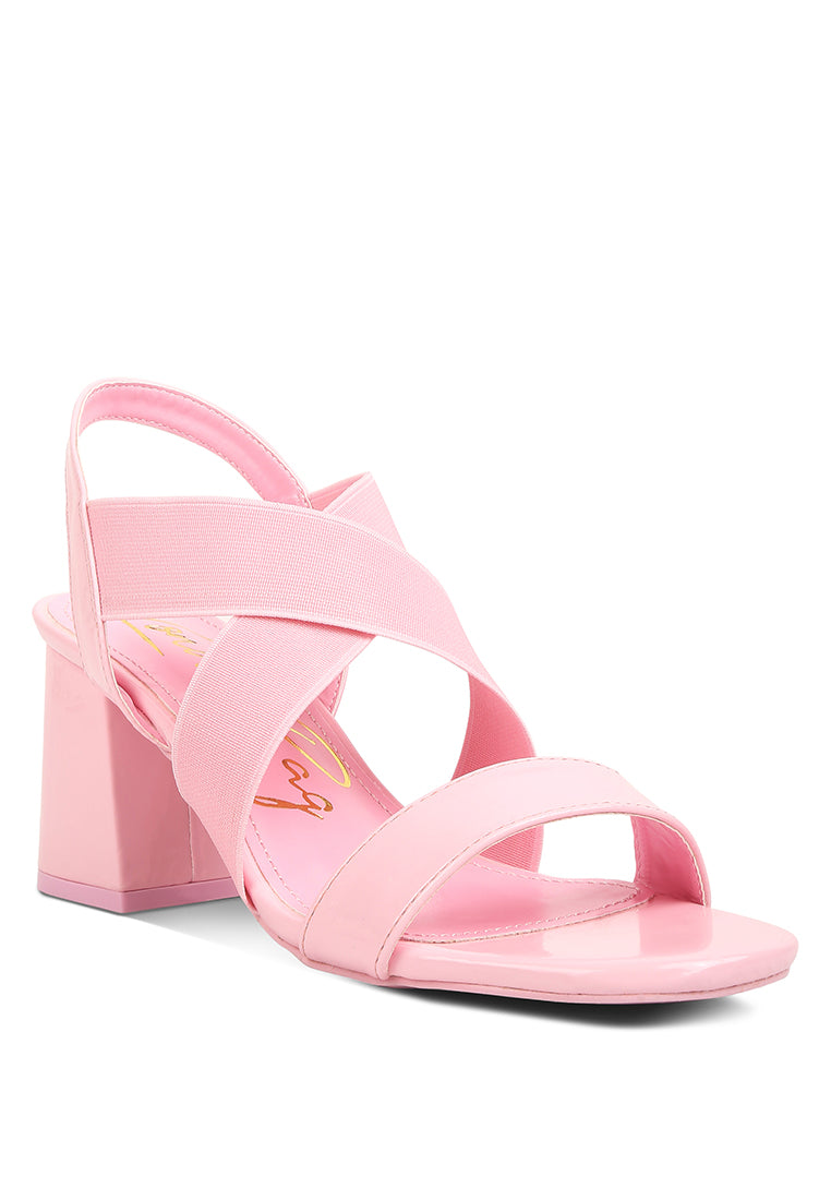 A pair of stylish Elastic Straps Block Heel Sandals featuring elastic straps, a block heel, and an open rounded toe design.