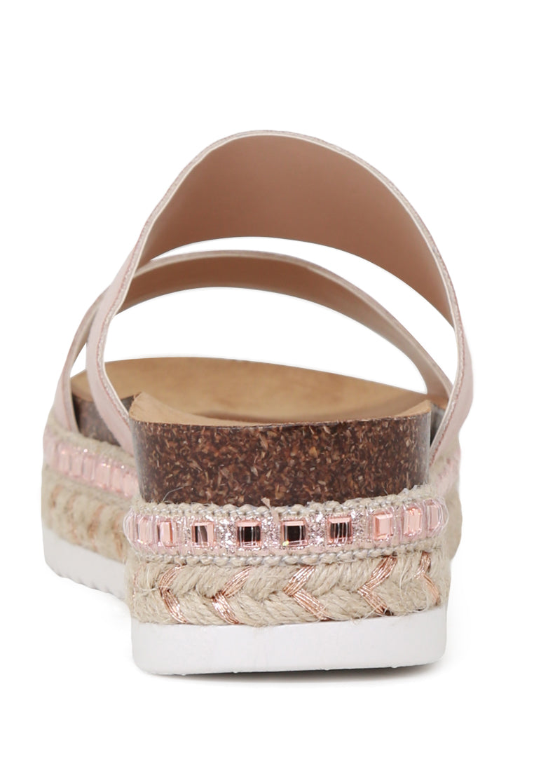 A pair of Elsa Double Strap Platform Espadrilles Wedges featuring a stylish double strap design and a comfortable platform heel, perfect for summer wear.