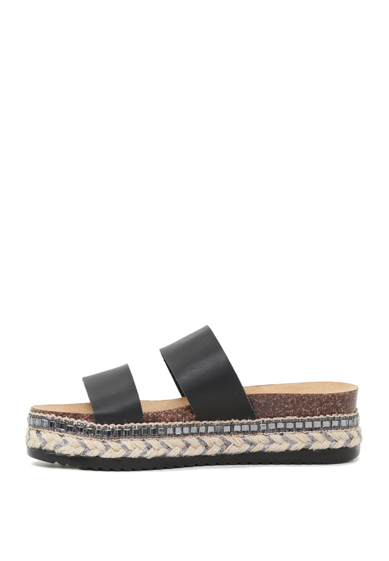 A pair of Elsa Double Strap Platform Espadrilles Wedges featuring a stylish double strap design and a comfortable platform heel, perfect for summer wear.