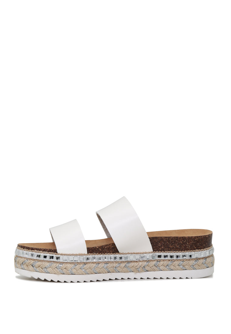 A pair of Elsa Double Strap Platform Espadrilles Wedges featuring a stylish double strap design and a comfortable platform heel, perfect for summer wear.