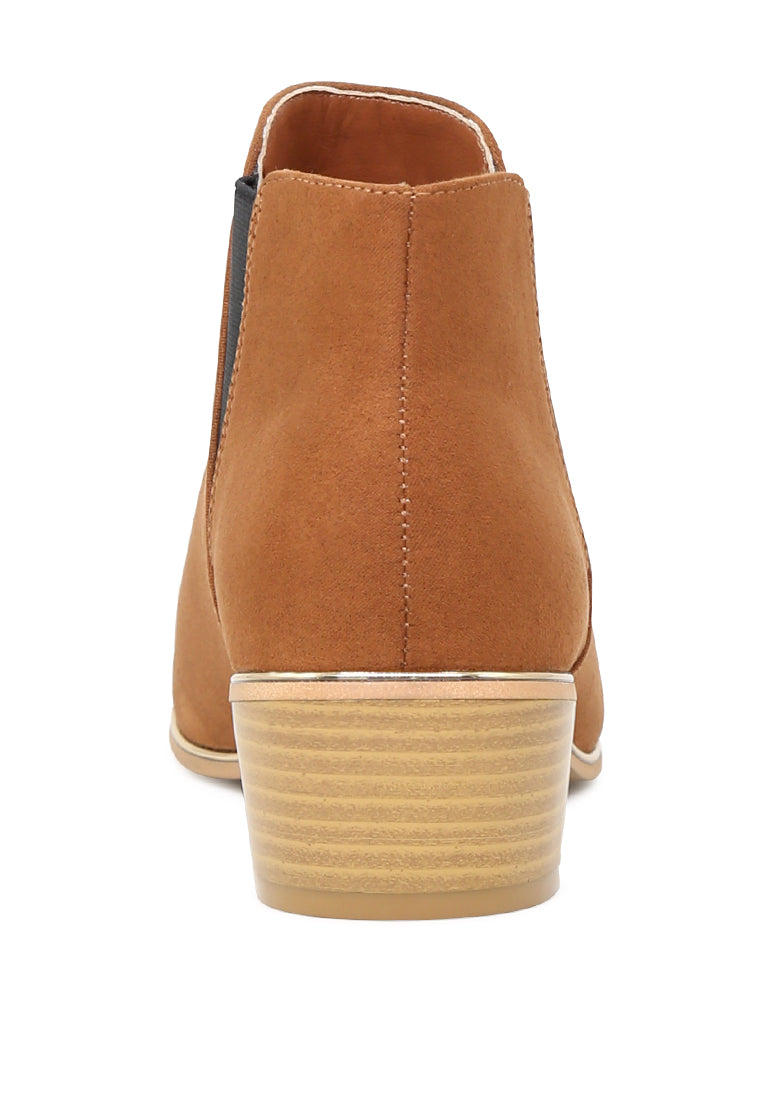 A pair of stylish Emmy Chelsea Boots featuring a block heel, round toe, and elasticated gussets, perfect for casual or dressy outfits.