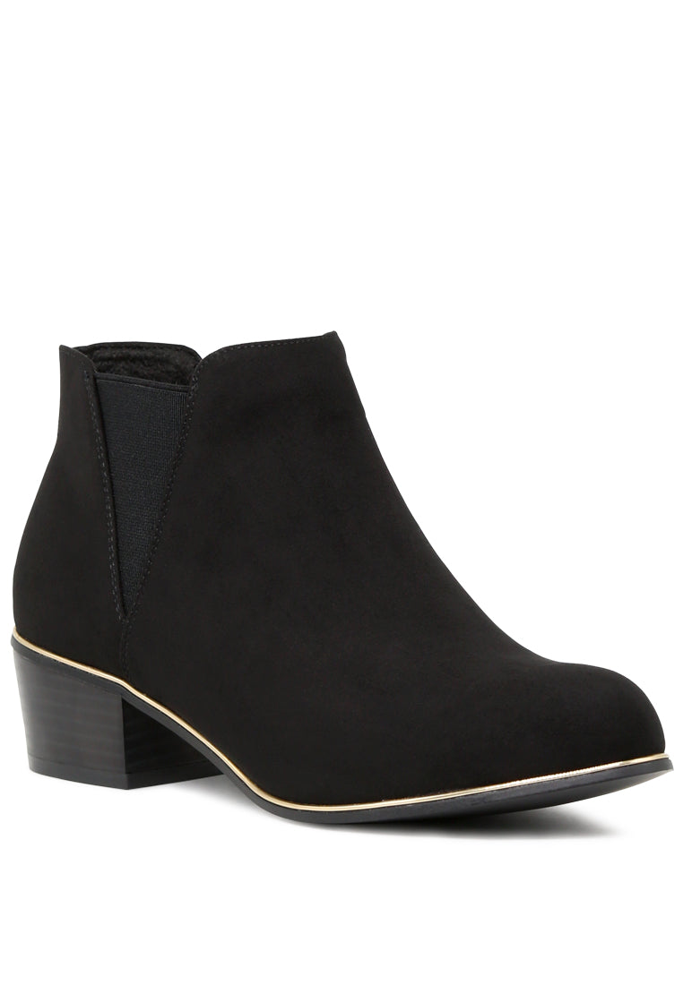 A pair of stylish Emmy Chelsea Boots featuring a block heel, round toe, and elasticated gussets, perfect for casual or dressy outfits.