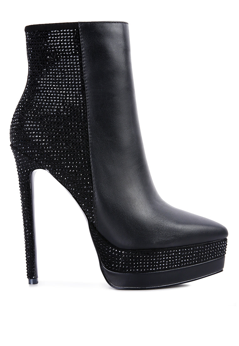 A pair of stylish Encanto High Heeled Ankle Boots featuring rhinestone details, closed pointed toe, and side zipper, perfect for glamorous outfits.