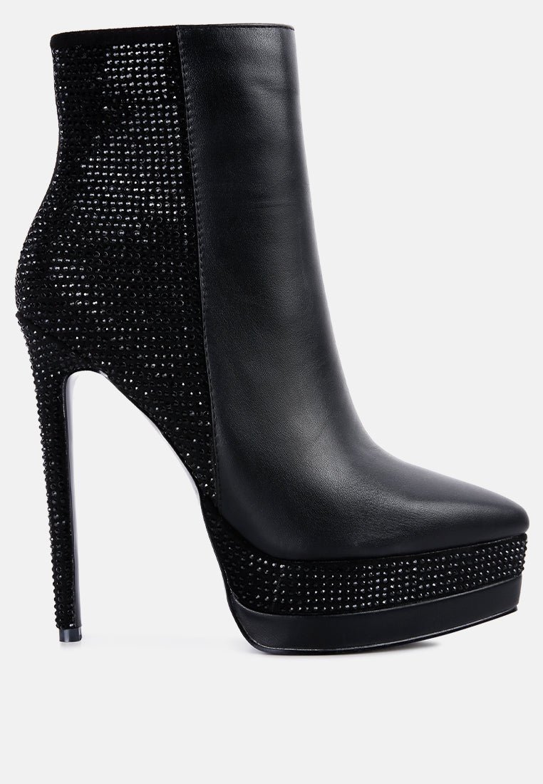 A pair of stylish Encanto High Heeled Ankle Boots featuring rhinestone details, closed pointed toe, and side zipper, perfect for glamorous outfits.