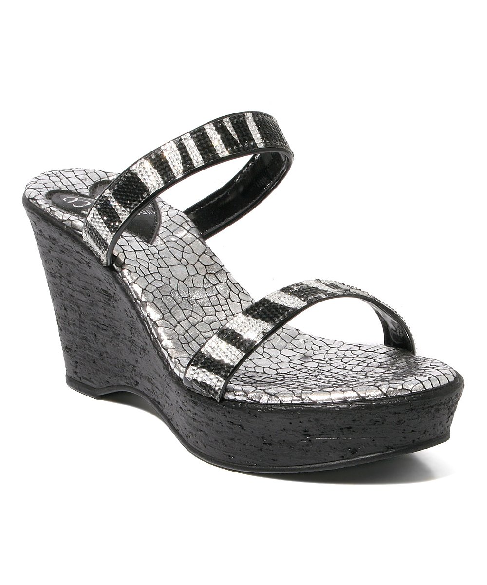 Encore statement wedges featuring snake print and rhinestone upper, perfect for stylish nights out.