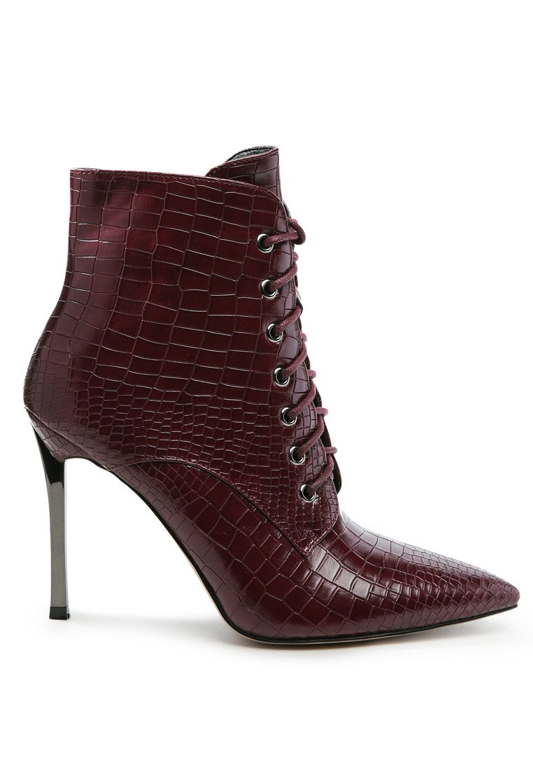 Escala Croc Stiletto Ankle Boots featuring a lace-up design and shiny stiletto heels, crafted from croc textured faux leather.