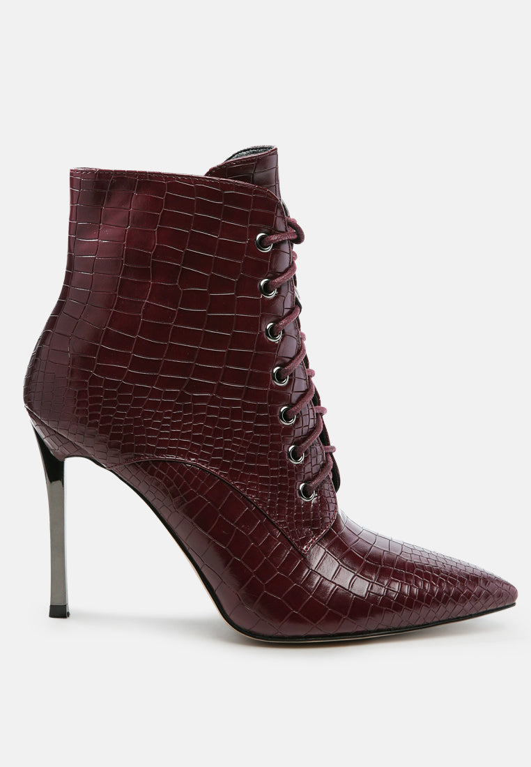 Escala Croc Stiletto Ankle Boots featuring a lace-up design and shiny stiletto heels, crafted from croc textured faux leather.