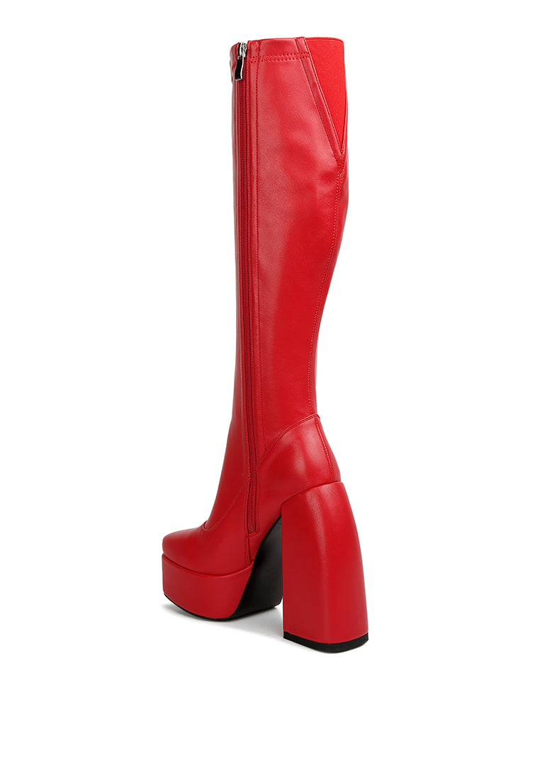 Fanning Platform Long Boots featuring a stylish design with a curved block heel, square toe, and side zipper, made from faux leather.