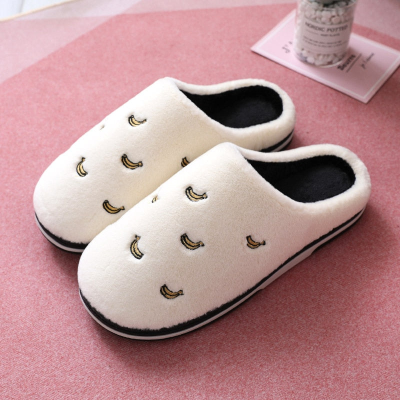 Fashion Fruit Indoor Slippers for Women featuring banana and cherry designs, plush material, and anti-slip sole, perfect for cozy indoor wear.