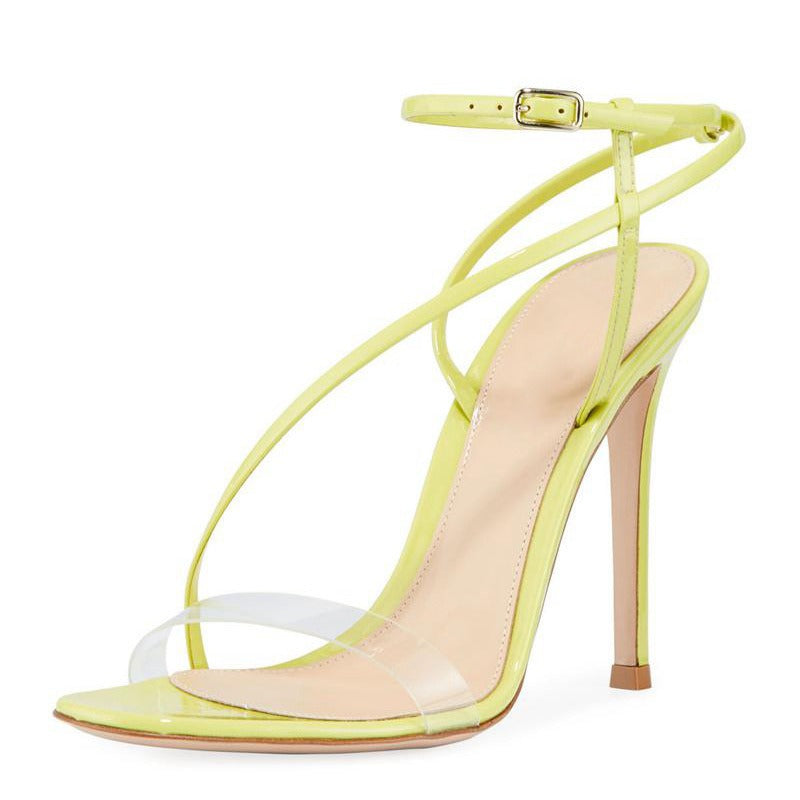 Fashion sandals featuring cross straps and thin heels, designed for women, showcasing a sleek patent leather finish.