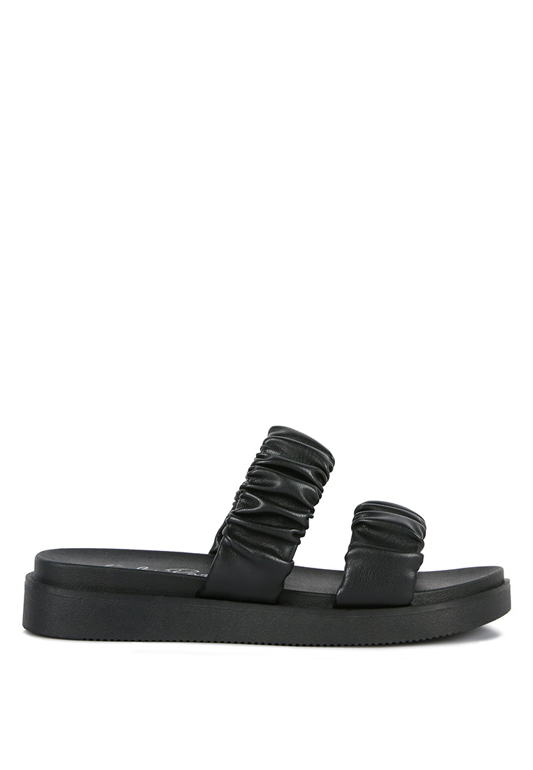 Stylish faux leather ruched strap platform sandals with padded insole and rubber outsole, perfect for casual wear.