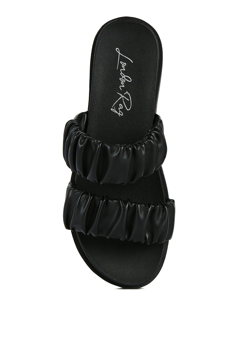 Stylish faux leather ruched strap platform sandals with padded insole and rubber outsole, perfect for casual wear.