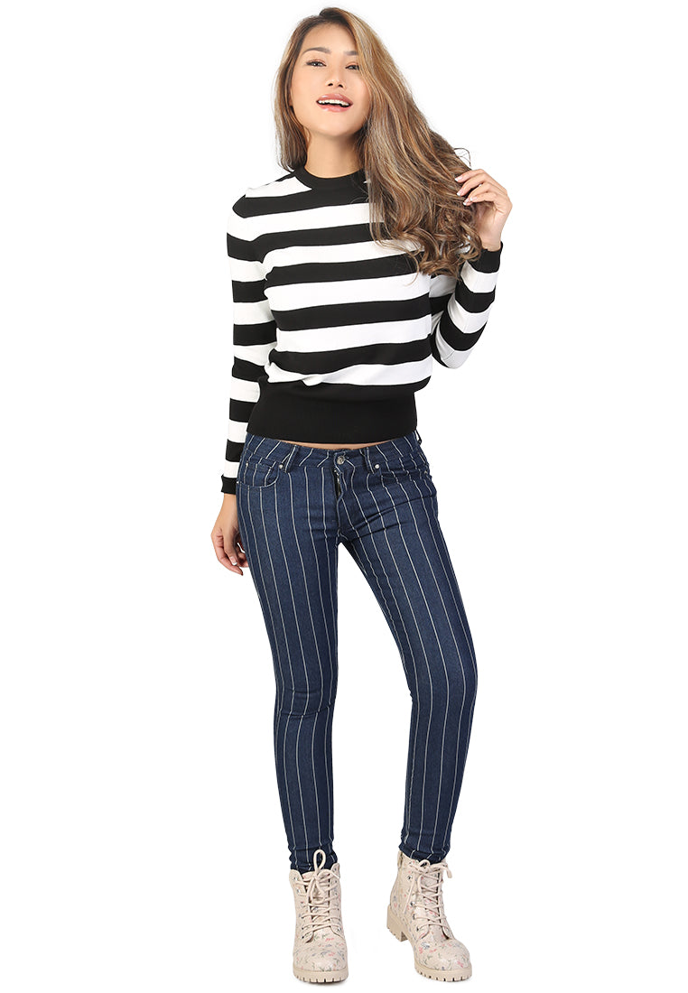 Fine Knit Striped Sweater featuring a round neck, long sleeves, and ribbed cuffs in a stylish striped pattern.