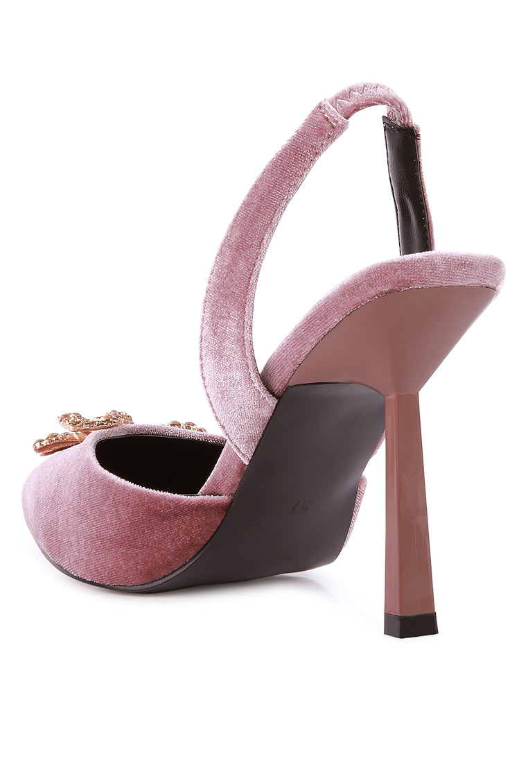 Firebird Pump high-heeled mules in luxurious velvet with a decorative diamante brooch, showcasing a closed pointed toe and elasticated slingback.