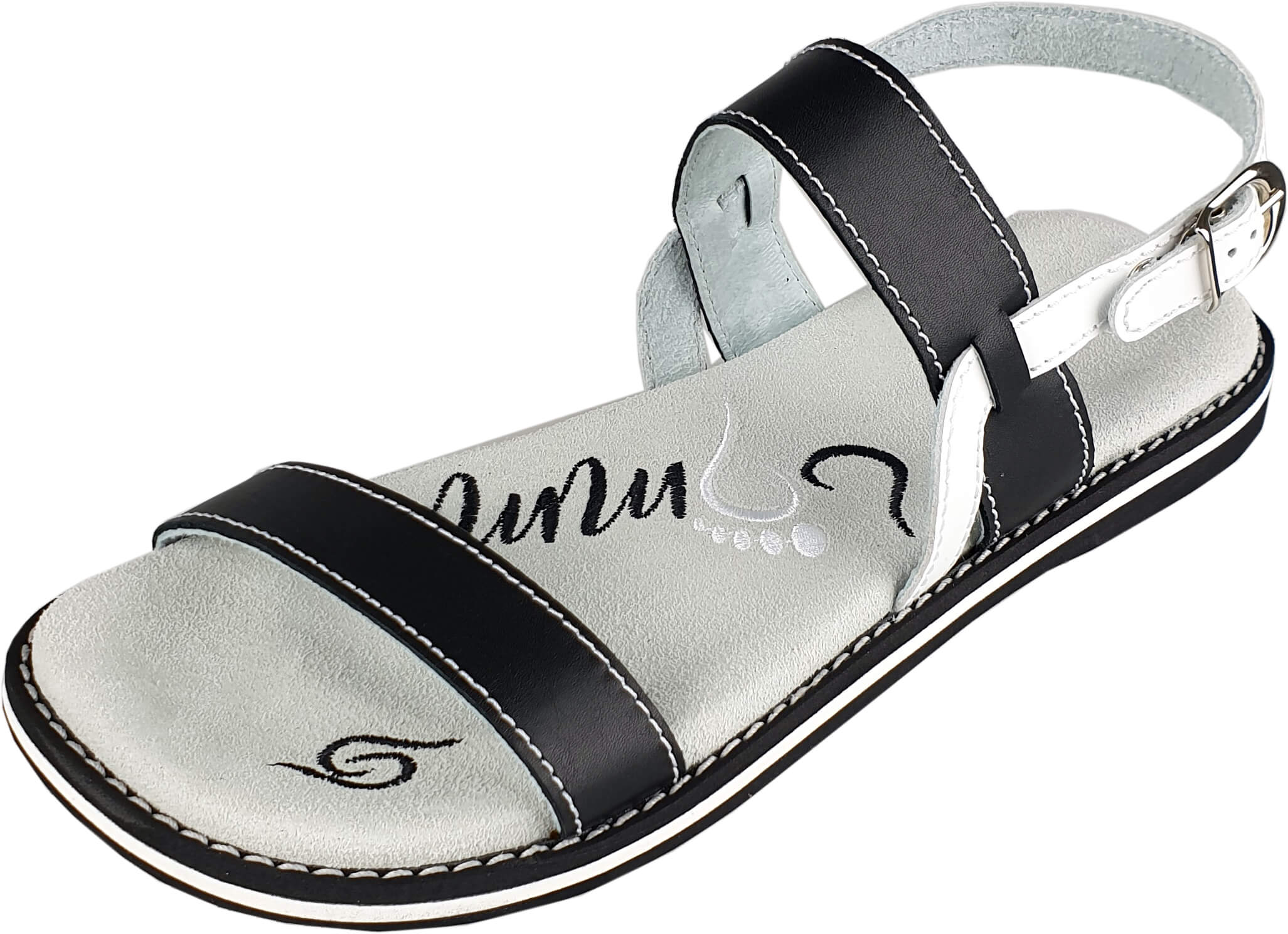 Stylish black and white leather flip-flops with adjustable strap and anatomical footbed, perfect for summer wear.