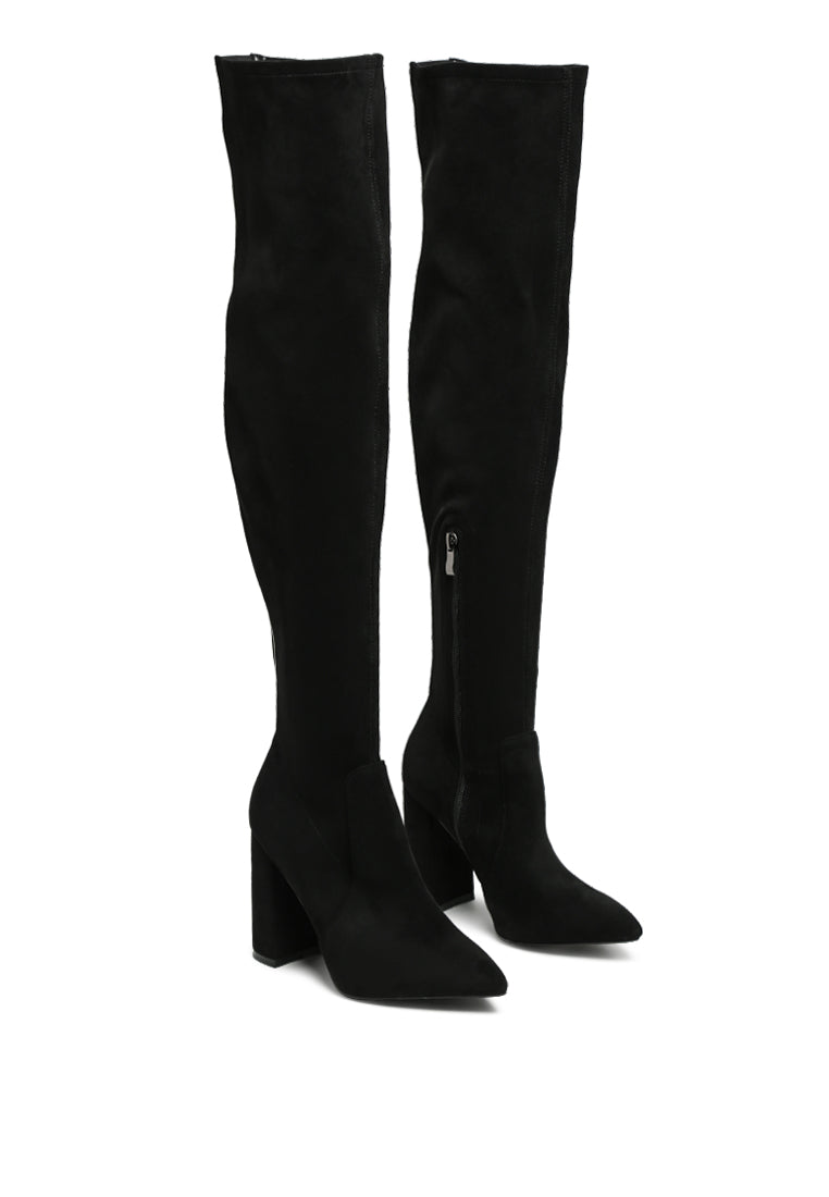 Flittle Over-The-Knee Boots featuring a stylish design with a block heel and pointed toe, made from faux leather.