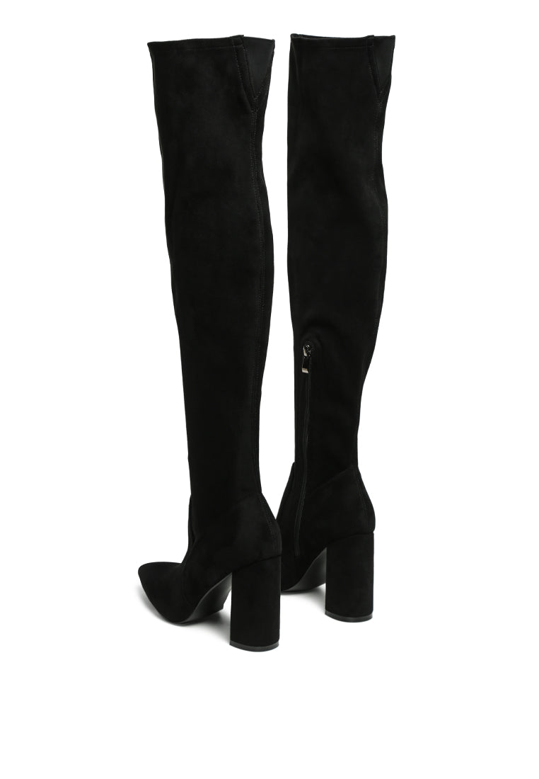 Flittle Over-The-Knee Boots featuring a stylish design with a block heel and pointed toe, made from faux leather.