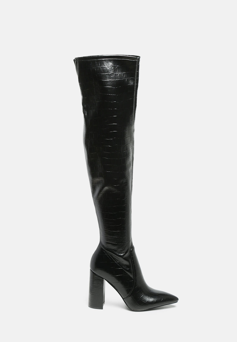 Flittle Over-The-Knee Boots featuring a stylish design with a block heel and pointed toe, made from faux leather.