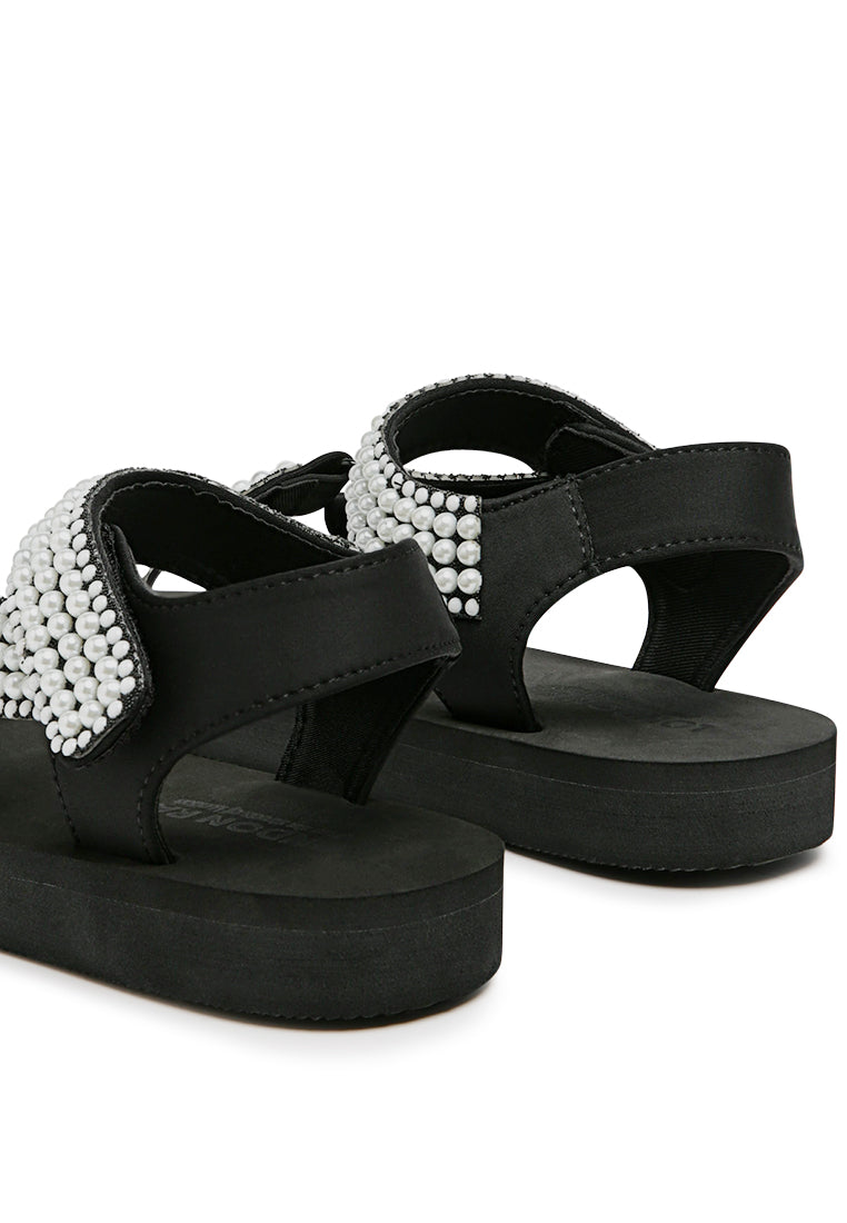 Stylish Floater Sandals in Black with faux pearl details and Velcro fastening, perfect for casual wear.