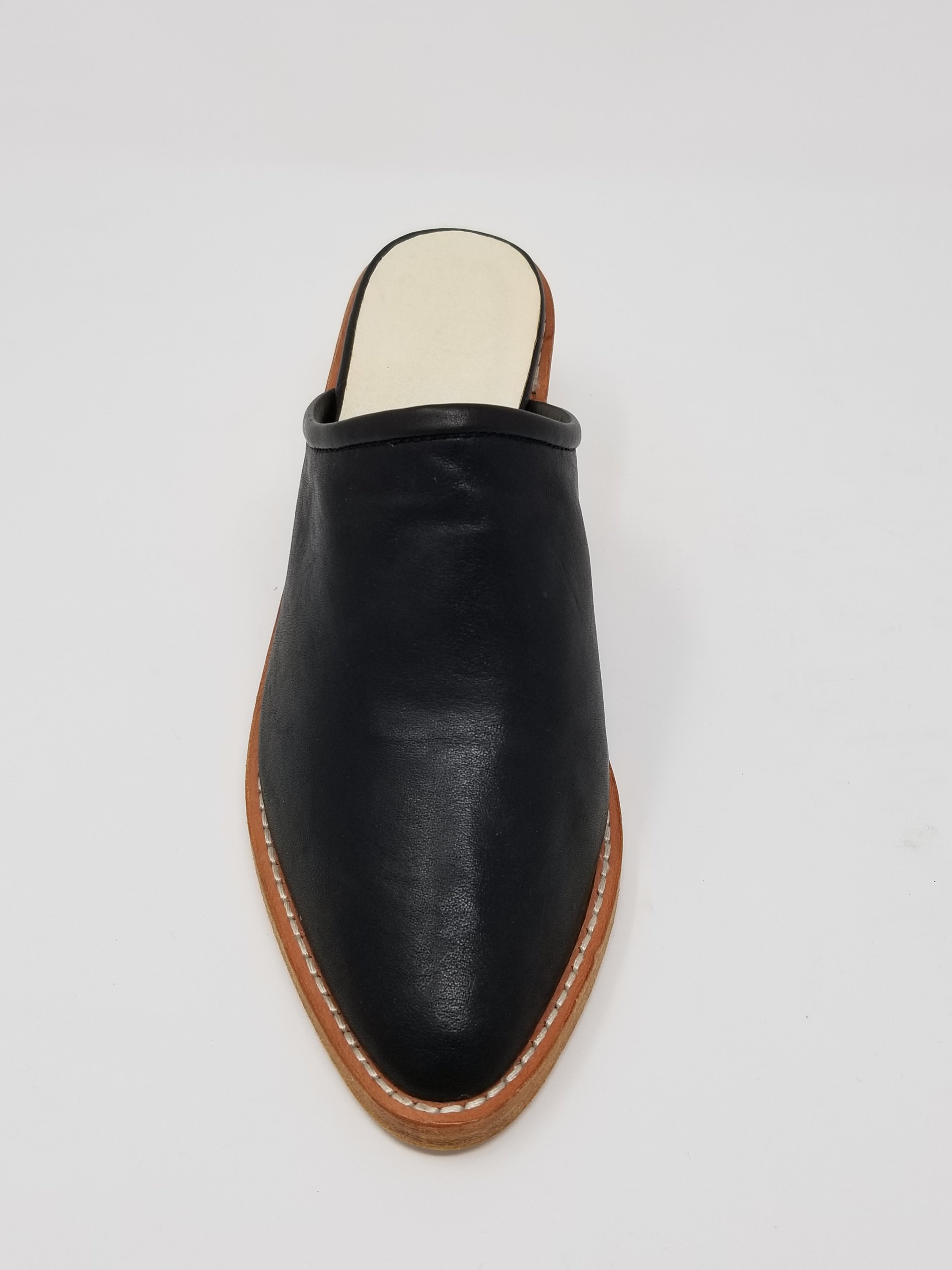 A pair of elegant Foxhill shoes featuring a full leather upper, memory foam insole, and stylish wood heel, perfect for any occasion.