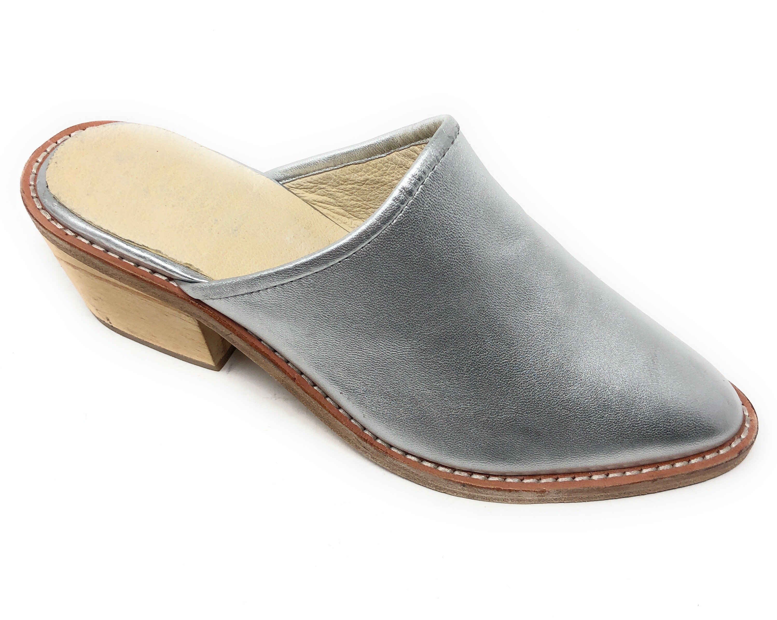 A pair of elegant Foxhill shoes featuring a full leather upper, memory foam insole, and stylish wood heel, perfect for any occasion.