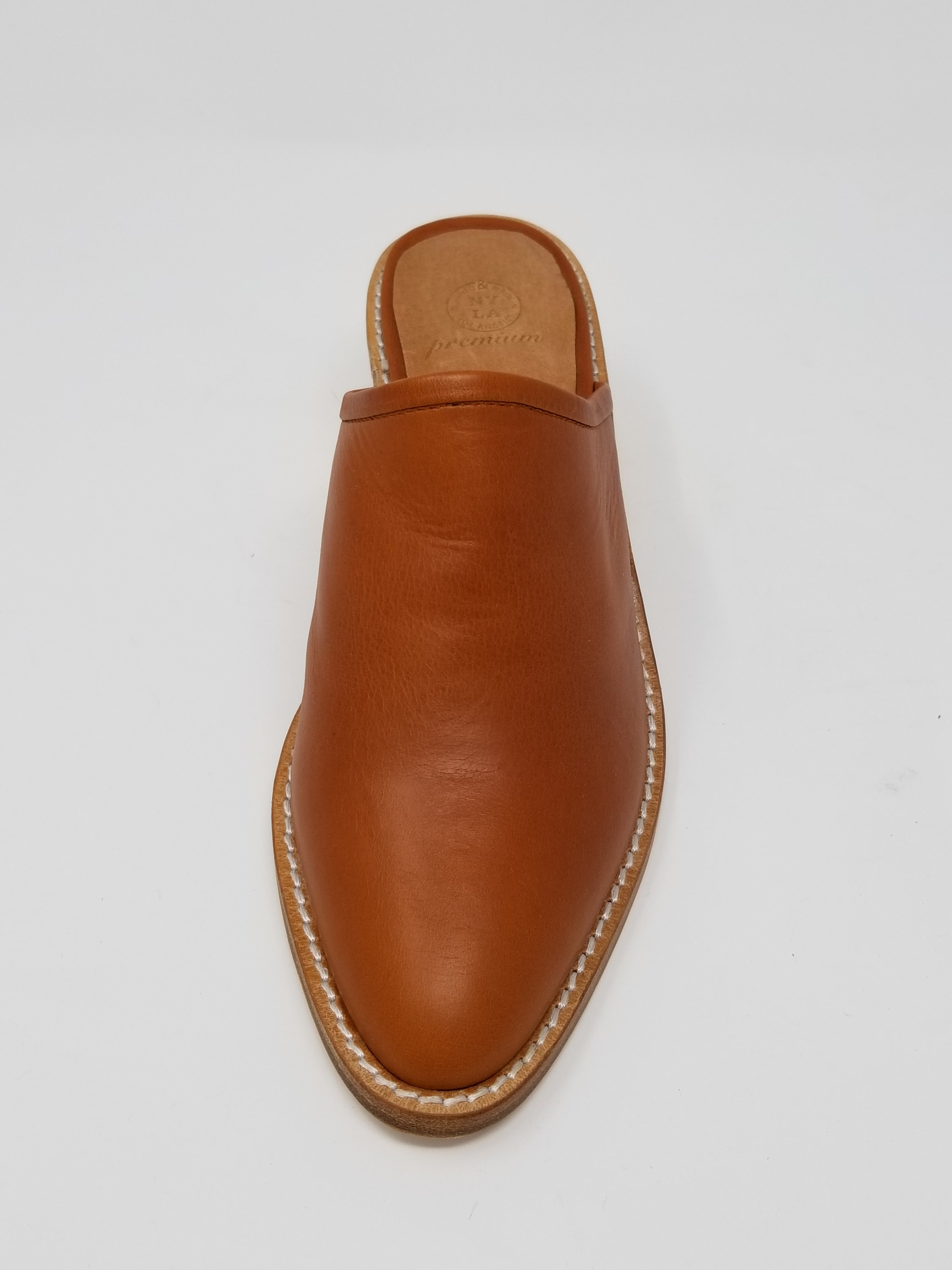 A pair of elegant Foxhill shoes featuring a full leather upper, memory foam insole, and stylish wood heel, perfect for any occasion.