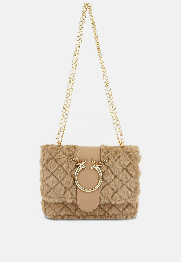 A stylish Furry Mini Sling Bag featuring faux fur material, fancy buckle details, and a long chain for versatile carrying options.