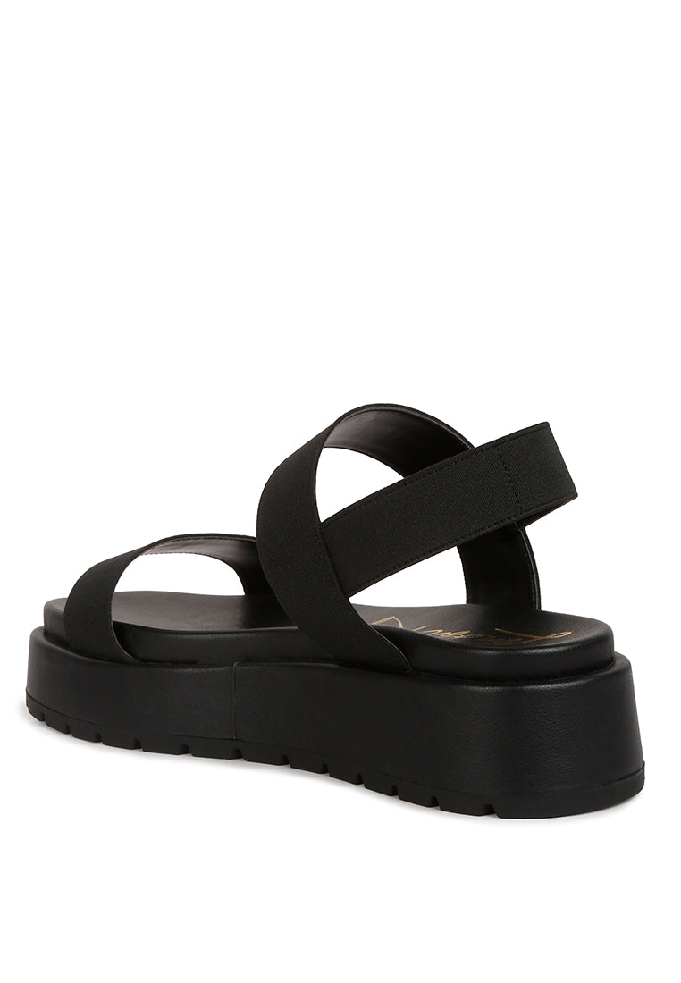 Garvela Chunky Flatform Sandals featuring faux leather, elasticated straps, and a stylish lug sole design.