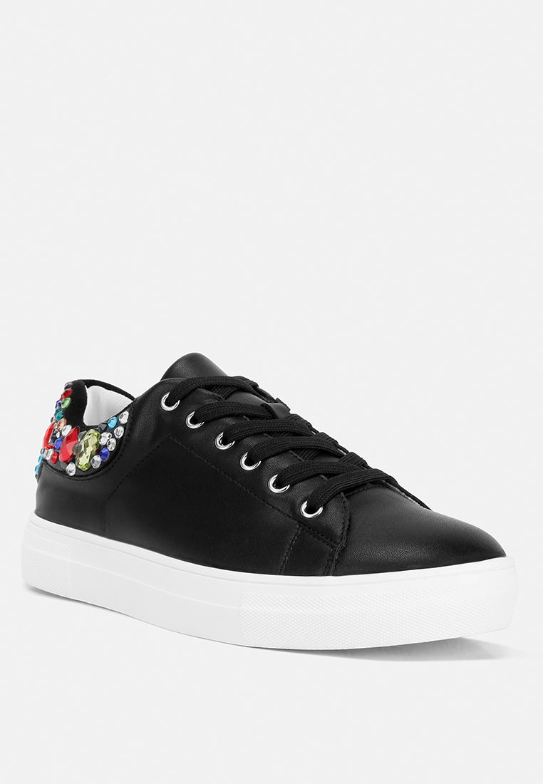 Gems Sneakers featuring diamante embellishments on faux leather, showcasing a stylish and casual design.