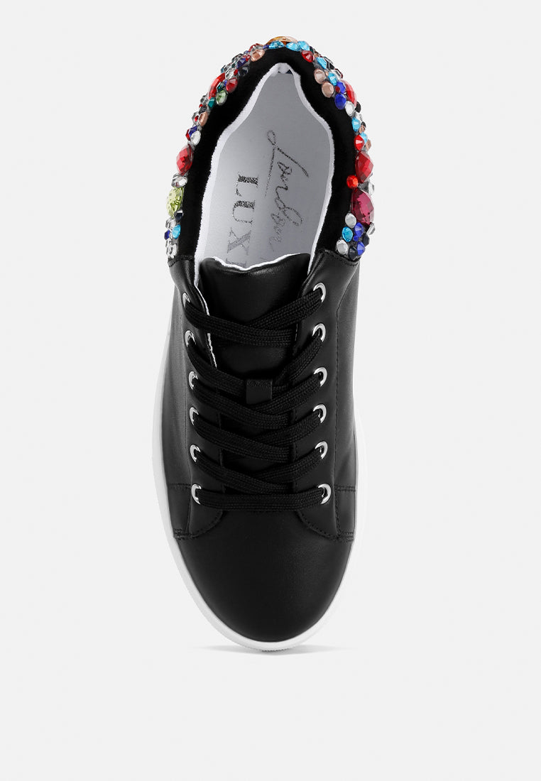 Gems Sneakers featuring diamante embellishments on faux leather, showcasing a stylish and casual design.