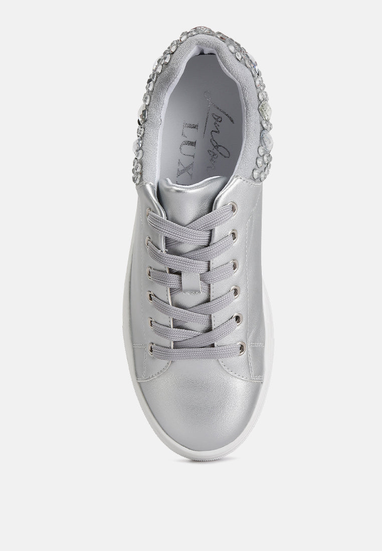 Gems Sneakers featuring diamante embellishments on faux leather, showcasing a stylish and casual design.