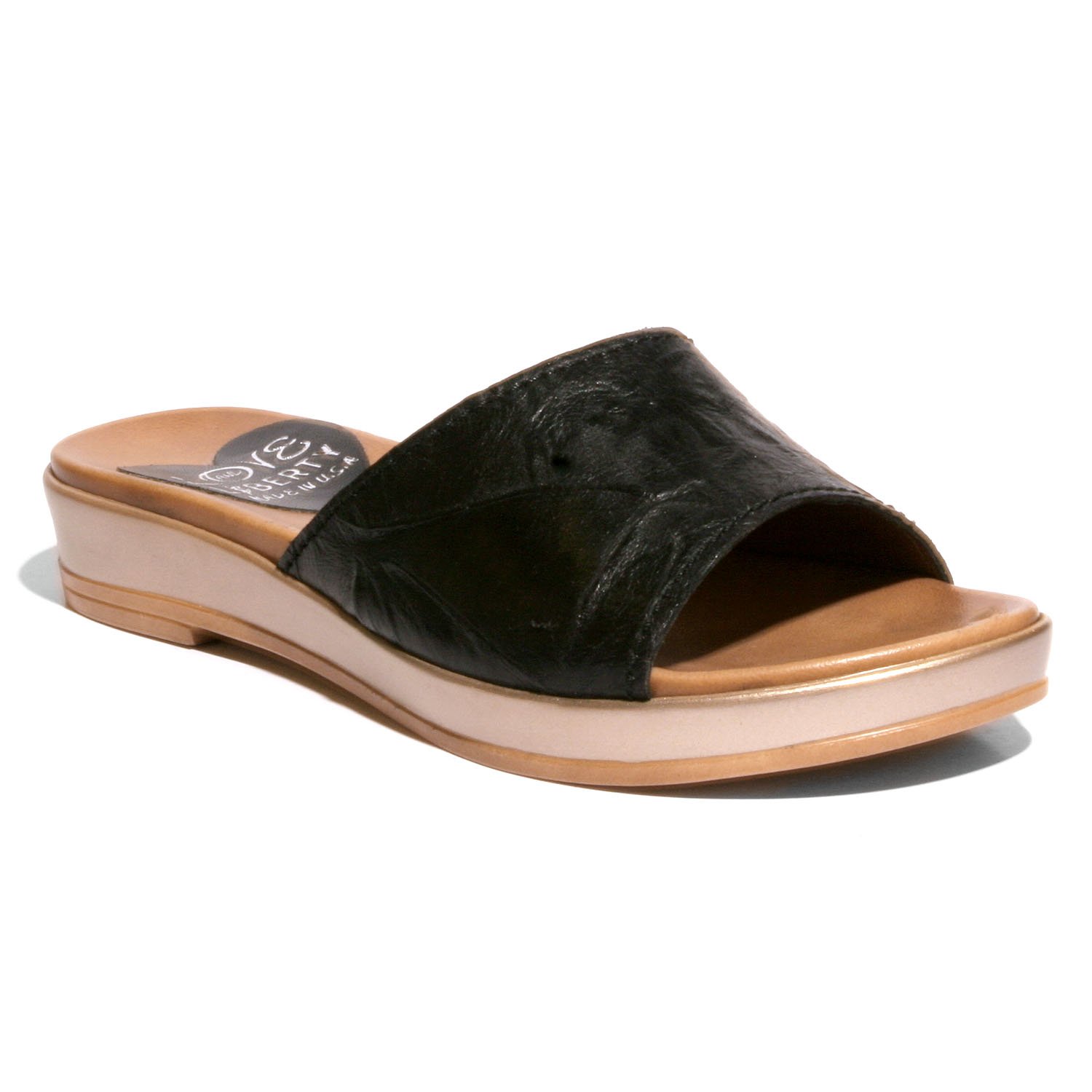 Stylish Getaway sandal with crinkled leather upper and low wedge outsole, perfect for any occasion.