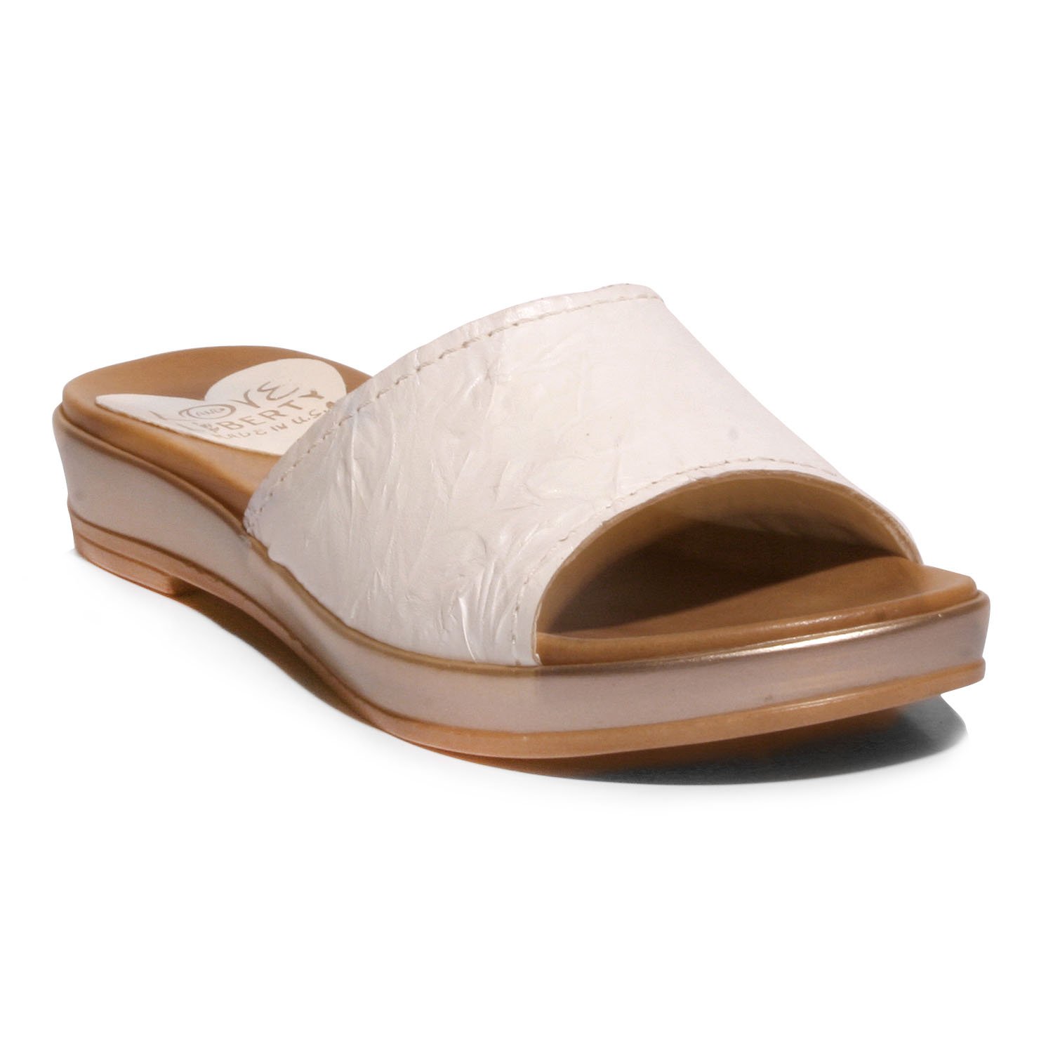 Stylish Getaway sandal with crinkled leather upper and low wedge outsole, perfect for any occasion.