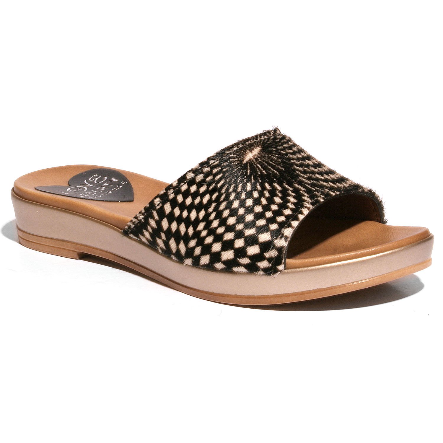 Stylish Getaway sandal with crinkled leather upper and low wedge outsole, perfect for any occasion.