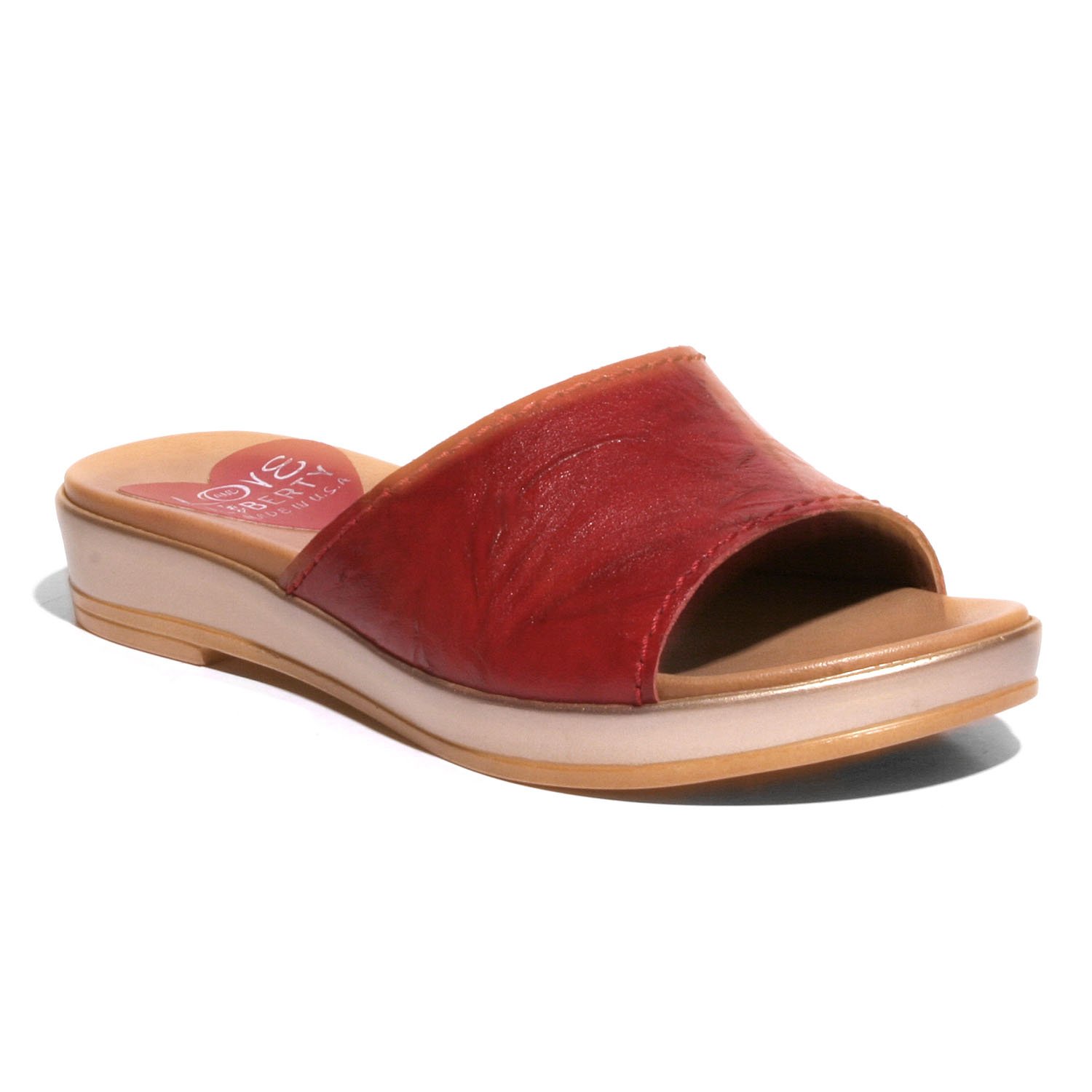 Stylish Getaway sandal with crinkled leather upper and low wedge outsole, perfect for any occasion.