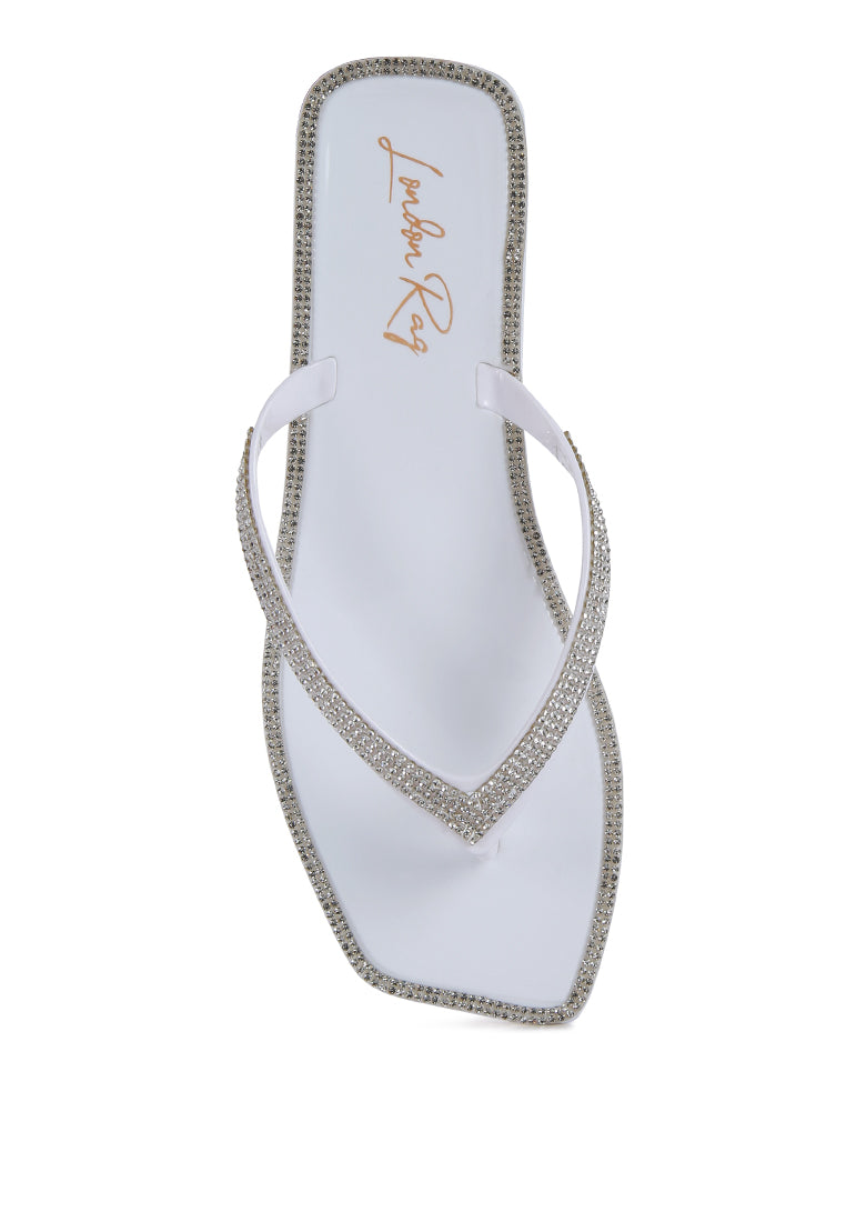 Stylish Golightly Diamante Stud Detail Thong Flats featuring sparkling studs and soft jelly material.