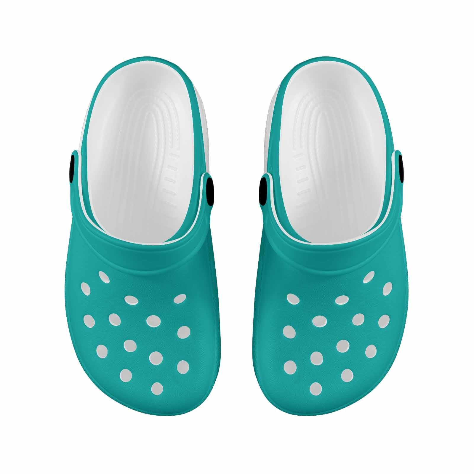 A pair of stylish green blue clogs designed for youth, featuring a slip-on design and cushioned sole for comfort.