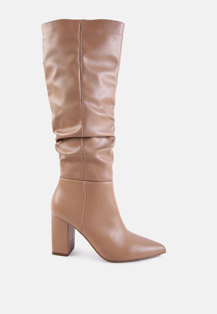 Hanoi Knee High Slouch Boots featuring a shiny finish, side zipper, and block heel design.