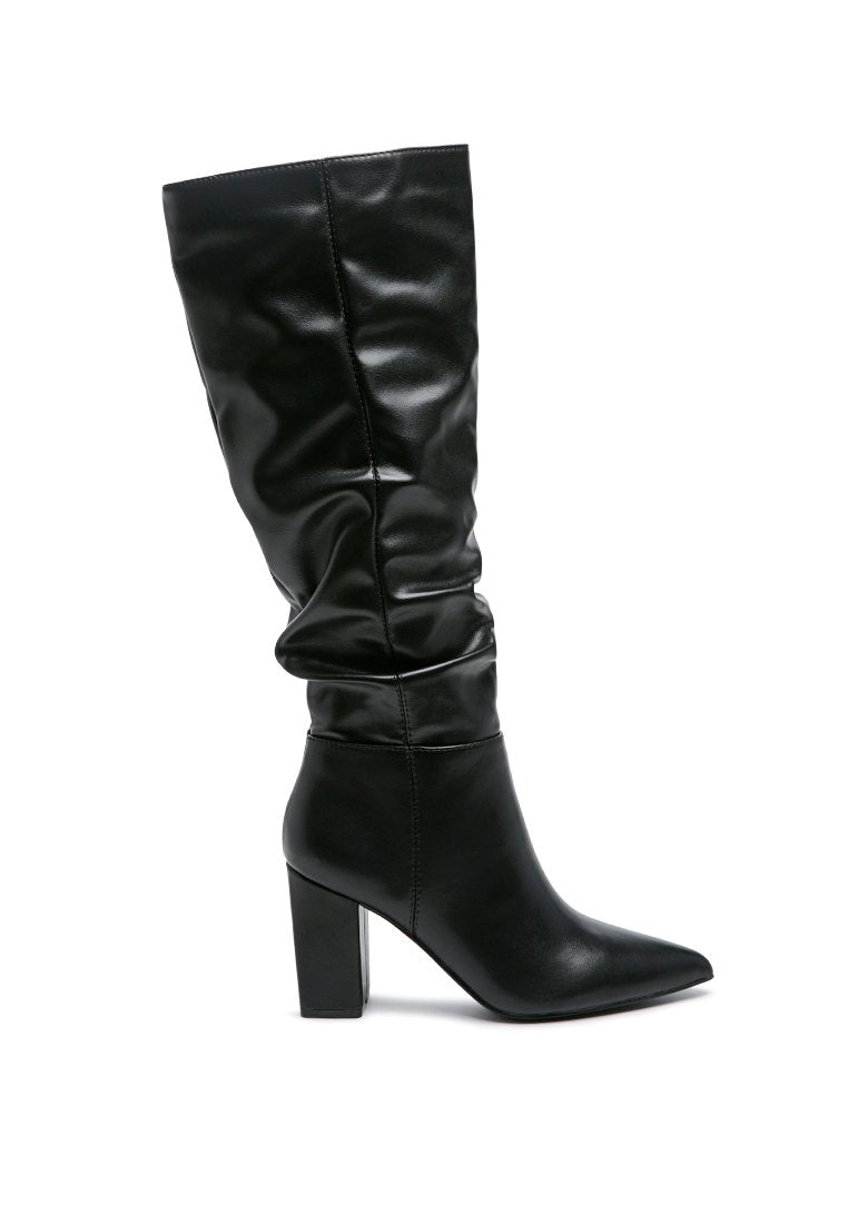 Hanoi Knee High Slouch Boots featuring a shiny finish, side zipper, and block heel design.