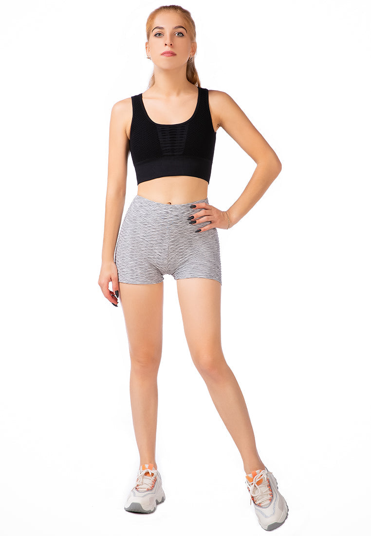 High Rise Biker Shorts in textured knitted fabric with a broad waistband, perfect for workouts and casual wear.