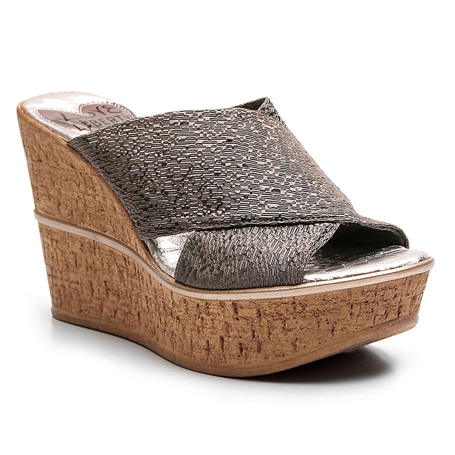 High Standards wedge featuring thick X-Cross band, snake print sock, and cork wedge outsole, perfect for stylish comfort.