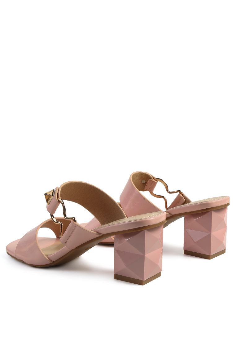 Elegant Hookup Fantasy Block Heel Sandals featuring a rock-cut design, metallic buckle, and open square toe.