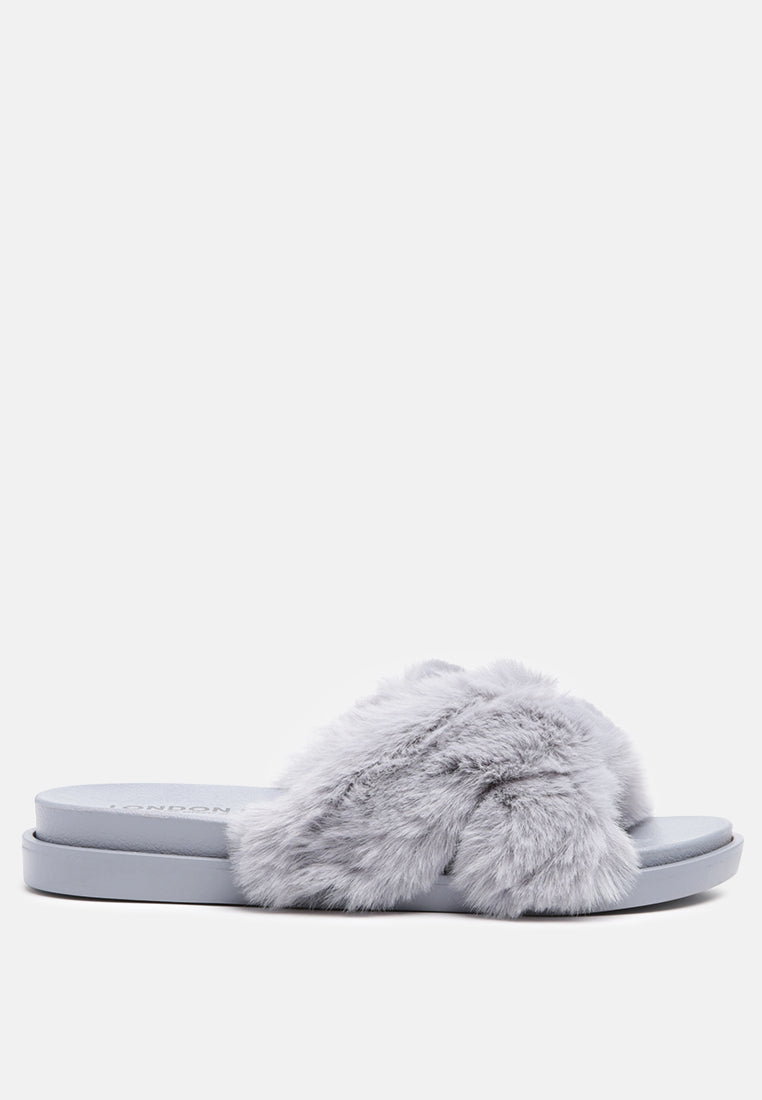 Homey Fur Slip-On Flats featuring a luxurious fur strap and durable outsole, perfect for stylish comfort.