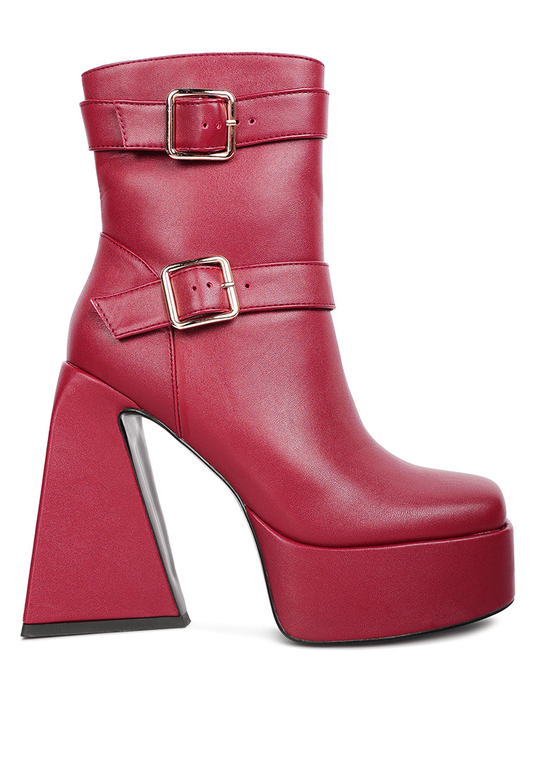 Hot Cocoa High Platform Ankle Boots with twin buckle straps and block heels, showcasing a stylish patent PU finish.